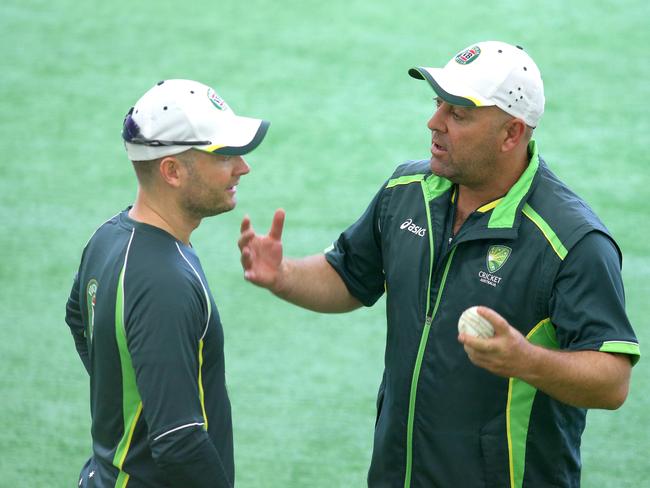 Michael Clarke and Darren Lehmann exchange views. Picture: Mark Cranitch.