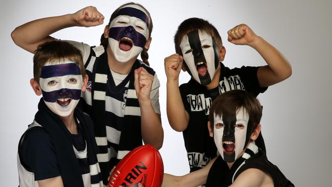 Geelong fans Georgie, 10 and Matt, 8 face off to their Collingwood counterparts Tommy, 7 and Christian, 8. Picture: Tim Carrafa