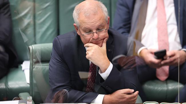 Prime Minister Scott Morrison with a reflection of Anthony Albanese in the screen, during Question Time in the House of Representatives in Parliament House Canberra. Picture: NCA NewsWire / Gary Ramage