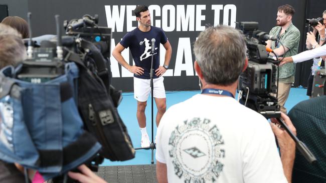 Novak Djokovic talks to the media after a practice session at Memorial Drive in Adelaide. Picture: Sarah Reed/Getty Images