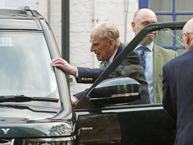 Britain's Prince Philip leaves King Edward VII Hospital in London, Tuesday Dec. 24, 2019. Prince Philip left hospital Tuesday after being treated for what Buckingham Palace called a â€œpre-existing condition.â€The 98-year-old is expected to join the rest of Britain's royal family for Christmas at Sandringham House in eastern England. (Philip Toscano/PA via AP)