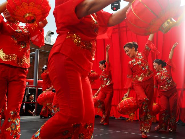 SYDNEY, AUSTRALIA - JANUARY 21: Dancers perform during the Sydney Lunar Streets Festival at Haymarket on January 21, 2023 in Sydney, Australia. The Lunar New Year or Spring Festival marks the transition of the Chinese zodiac sign from one animal to the next. 2023 sees in the Year of the Rabbit, which begins on January 22. In Chinese culture, the Rabbit is a symbol of longevity, peace and prosperity. The festival is celebrated in Australia by the country's significant Chinese-origin minority, who follow much of the same traditions as the Chinese diaspora in the rest of the world. (Photo by Lisa Maree Williams/Getty Images)