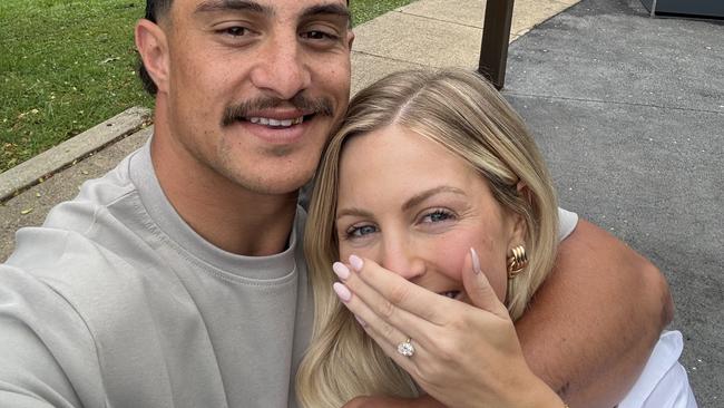 Brisbane Broncos star Kotoni Staggs and his fiancee Brittany Becht show off the ring after their engagement. Picture: Supplied/Kotoni Staggs