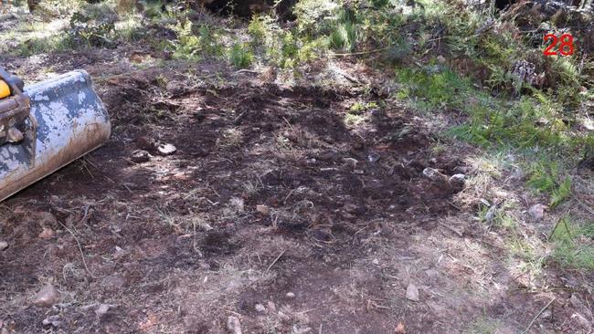 Forensic officers excavate the Union Spur track where the remains of Russell Hill and Carol Clay were located in December 2021. Picture: Supplied/ Supreme Court Victoria.