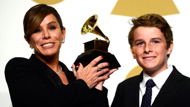 Melissa Rivers with son Cooper Endicott accepting a posthumous Grammy last year for late mother and grandmother Joan. Picture: Frazer Harrison / Getty Images