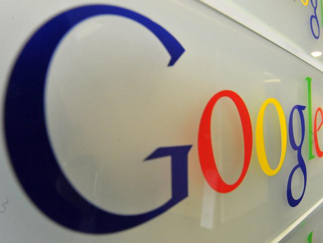 (FILES) - A photo taken on February 5, 2014 shows the Google logo on a wall at the entrance of the Google offices in Brussels. Germany's justice minister called for the possibility of dismantling Google if it abuses its dominant market position, in an interview with a newspaper to be published on June 28, 2014. AFP PHOTO GEORGES GOBET