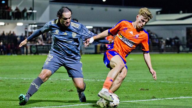 Shelford Dais (left) battles with Jack Skinner of Lions FC. Picture: Lions FC