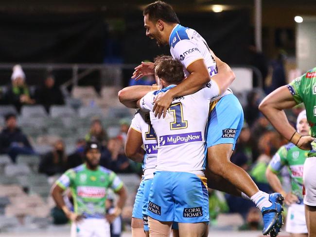 CANBERRA, AUSTRALIA - JULY 03: Moeaki Fotuaika of the Titans celebrates after scoring a try during the round 16 NRL match between the Canberra Raiders and the Gold Coast Titans at GIO Stadium, on July 03, 2021, in Canberra, Australia. (Photo by Mike Owen/Getty Images)