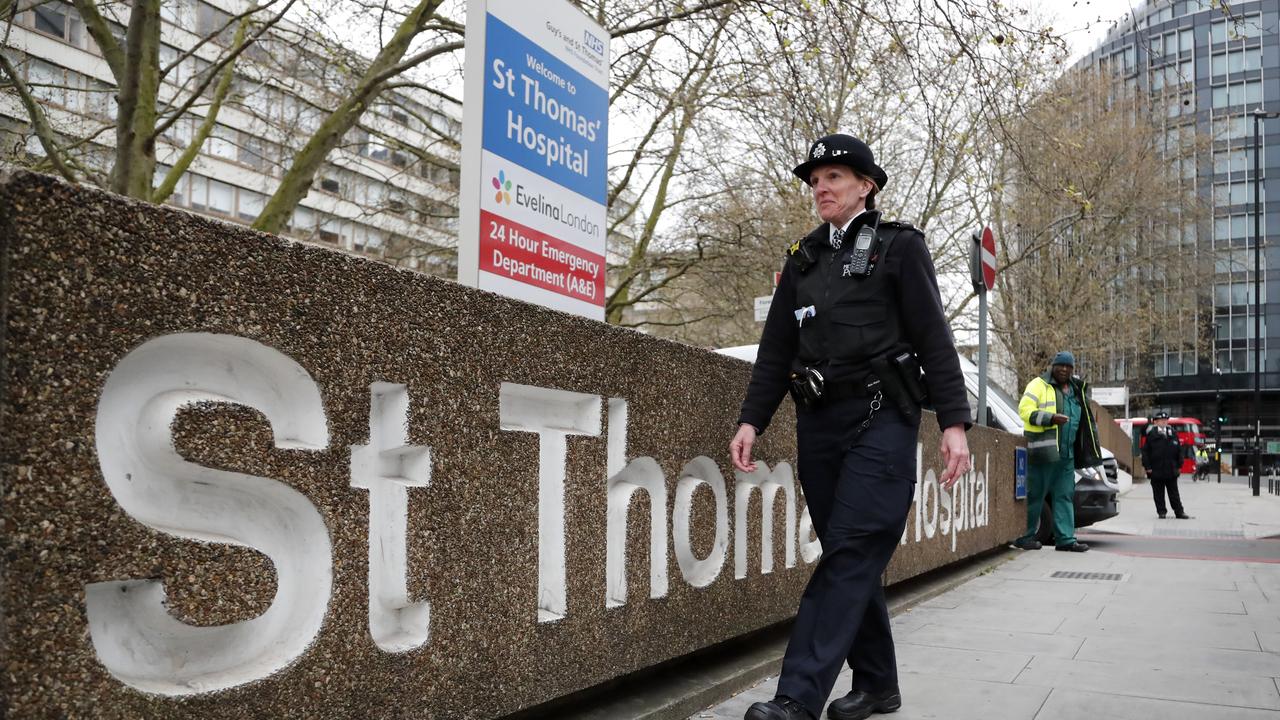 A police officer patrols outside a hospital where it’s believed Boris Johnson is undergoing tests. Picture: Frank Augstein