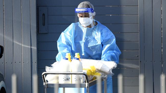 MELBOURNE, AUSTRALIA - NewsWire Photos FEBRUARY 7, 2022: Staff wearing full PPE at Twin Parks Aged Care facility at Reservoir which has had a Covid outbreak. Picture: NCA NewsWire / Andrew Henshaw