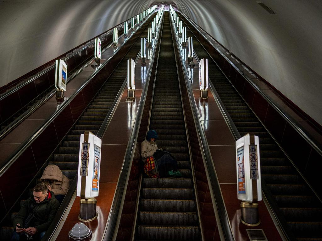 Civilians take shelter at a metro station during a missile attack in Kyiv. Picture: AFP