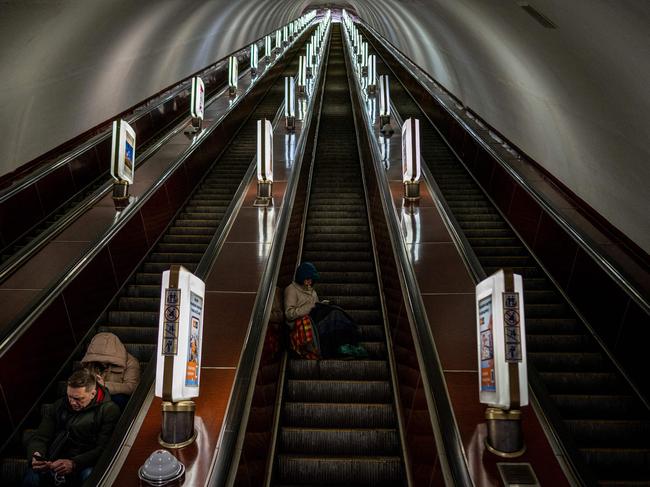 Civilians take shelter at a metro station during a missile attack in Kyiv. Picture: AFP