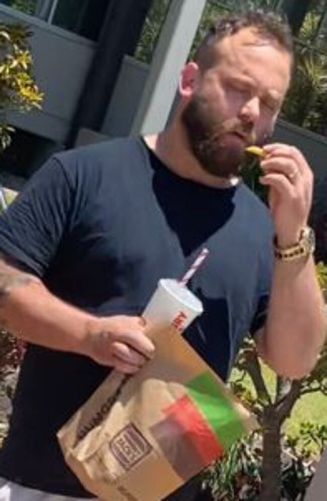 Peter Matthew Dati was seen outside the Maroochydore Police Station eating Hungry Jack's after he was granted bail in the court next door.