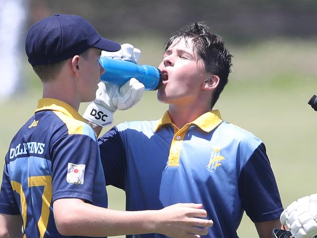 Day 1 of the Queensland Junior Representative Cricket Carnival at TSS. U/14s Gold Coast Dolphins(batting) V Sunshine Coast. Cooper Brown and Taylor Waugh take drinks.. Picture Glenn Hampson