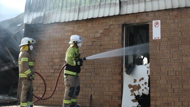 Fire crews at the scene of the business fire at Edwardstown. Picture: Dean Martin