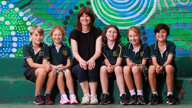 Angela Breeze, an instructor in the small group tuition program, with Crown Street Public School students Nash Fryer, 8, Marley Anstey, 7, Izzy Osborne, 8, Sia Griffiths, 8, and Aki Niwa Russell, 10. Picture: Justin Lloyd.