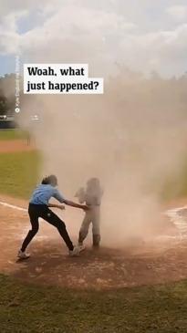 Umpire saves little league player from whirlwind