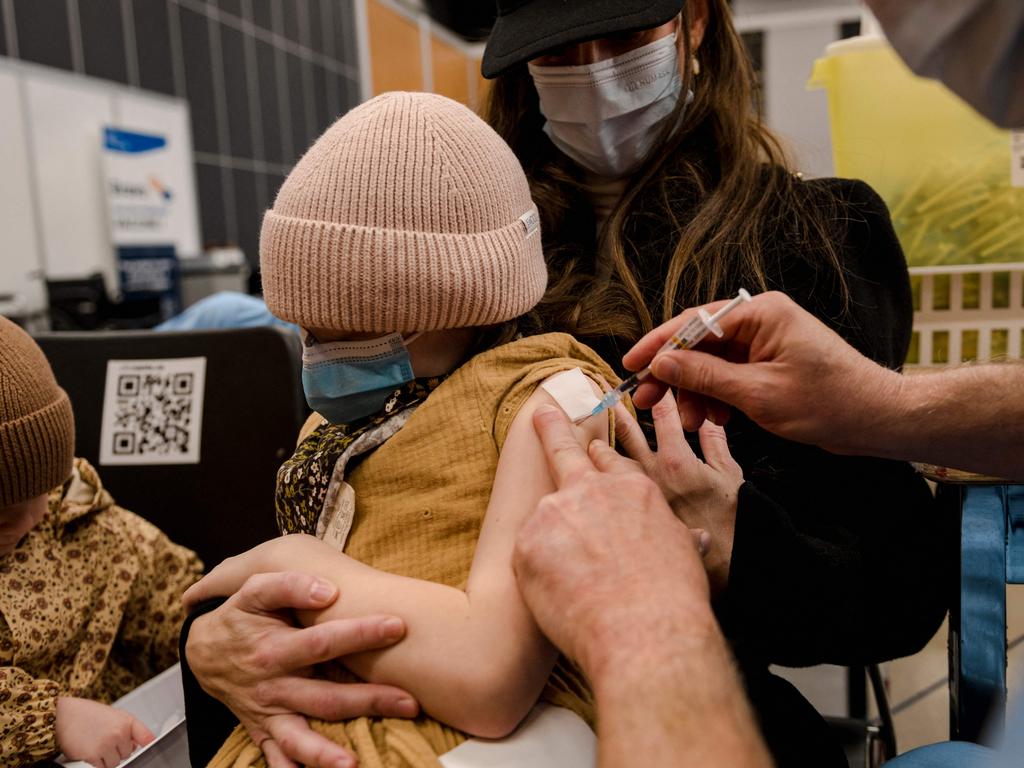 A seven-year-old child receives the Pfizer vaccine in Montreal. Picture: Andrej Ivanov/AFP