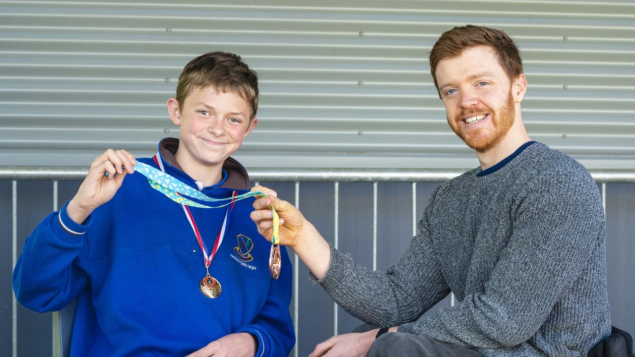 Harristown State High School student Seth Foster chats with Birmingham 2022 Commonwealth Games bronze medallist Sam Carter. Picture: Kevin Farmer