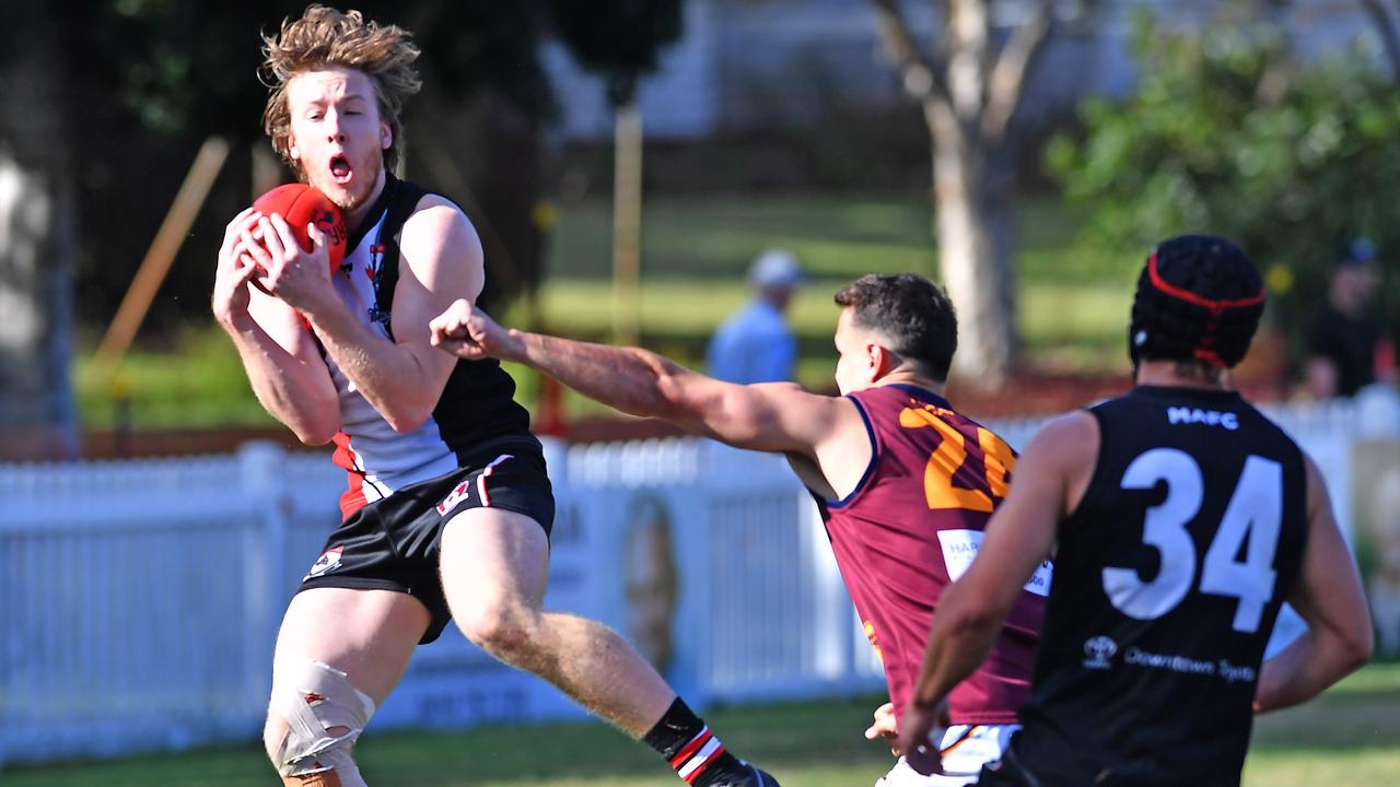 Morningside player Nathan Colenso takes a mark QAFL game between Morningside and Palm Beach Currumbin. Saturday May 22, 2021. Picture, John Gass