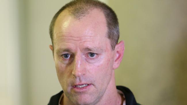 Souths coach Michael Maguire arriving in Brisbane. Picture: Darren England