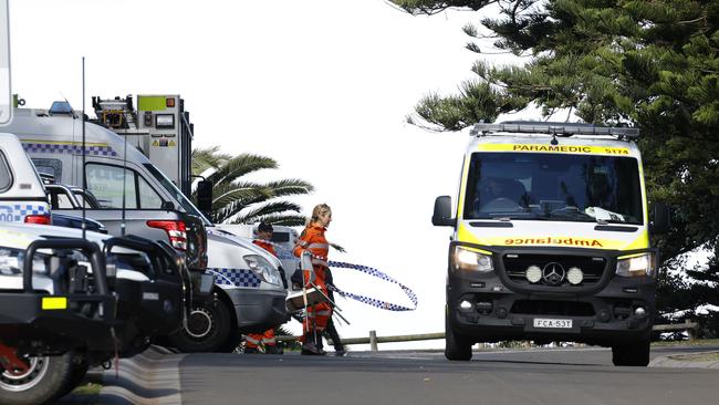 Emergency services on scene during search at Storm Bay, Kiama. Picture: Richard Dobson