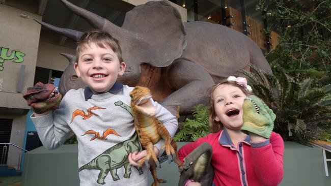 Henry Clarke 5 and Poppy Robertson 5 who are excited about the Queensland Museum reopening. Pic Peter Wallis