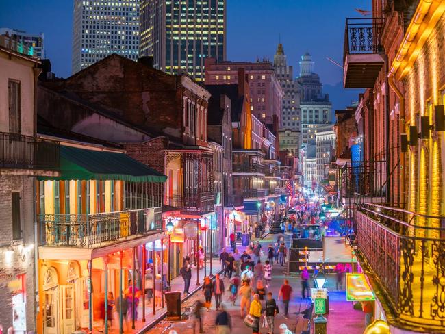 Pubs and bars with neon lights in the French Quarter, New Orleans USAESCAPE 16 OCTOBER  2022 DEALS