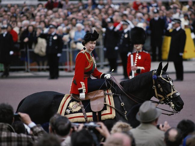 Her Majesty rides Burmese – a gift from the Canadian Government – during Trooping the Colour on Horse Guards Parade in 1979. Picture: Tim Graham/Getty