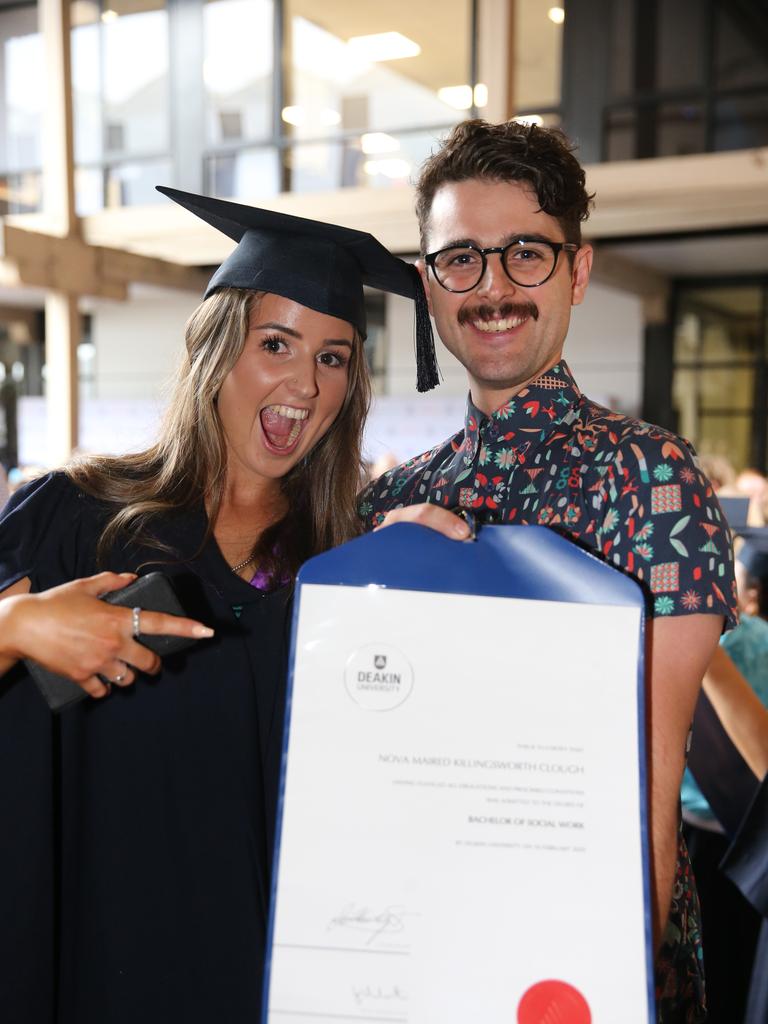 Graduates Tossing Academic Hats