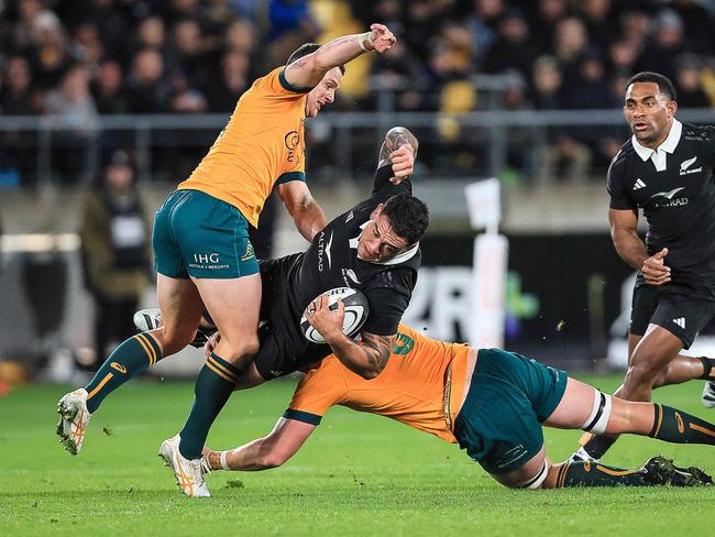 Australia's Dylan Pietsch tackles New Zealand's Codie Taylor. Picture: AFP