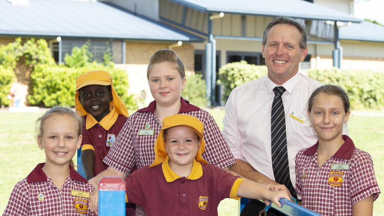 Kurt Dutney, principal of Immaculate Heart Catholic Primary School, with students