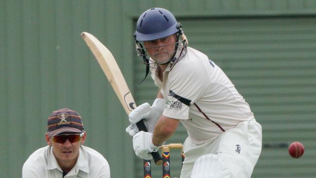 Simon Dart watches the ball intently on his way to 169 not out for Red Hill against Old Peninsula on Saturday. Picture: Valeriu Campan