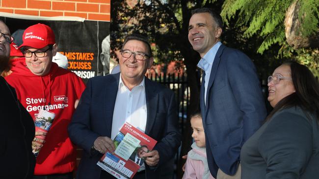 Member for Adelaide Steve Georganas supported by Premier Peter Malinauskas, who arrived with daughter, Sophie to join the voting lineup. Picture: Dean Martin