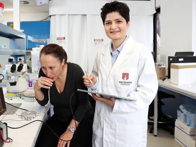 Dr Noushin Nasiri watches on as her patient, Vanessa, uses the new breathalyser she invented which can detect cancer and other diseases. Picture: Tim Hunter