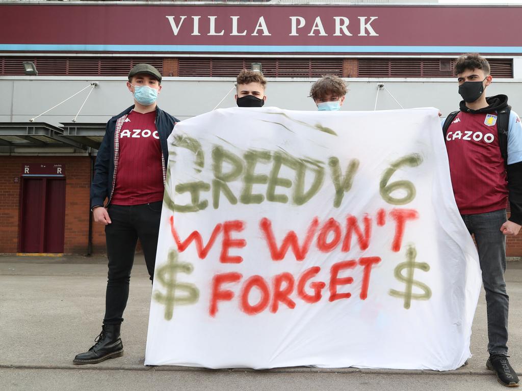 Fans display a banner reacting to the collapse of the planned creation of a European Super League.