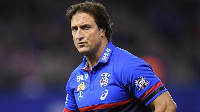 Luke Beveridge is caught in an ugly crossfire.