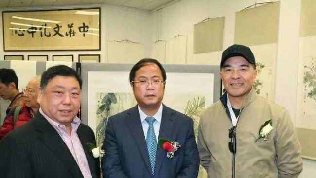 Former NSW MP Ernest Wong and Chinese billionaire Huang Xiangmo appear together in images posted to Wong's official MP Facebook account.