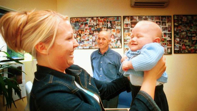 Left to right: Bethany Wheaton, Dr Michael Chambers and baby Xavier. Dr Chambers delivered both mother and baby.