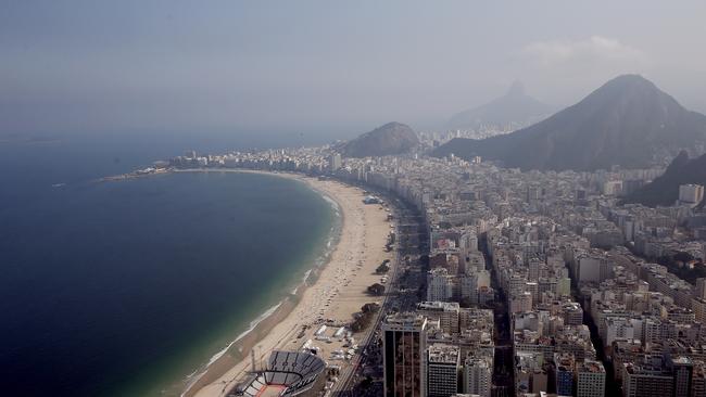 RIO DE JANEIRO, BRAZIL - JULY 25: Work continues on the Olympic Beach Volleyball Arena in preparation for the 2016 Summer Olympic Games on July 25, 2016 in Rio de Janeiro, Brazil. (Photo by Matthew Stockman/Getty Images)