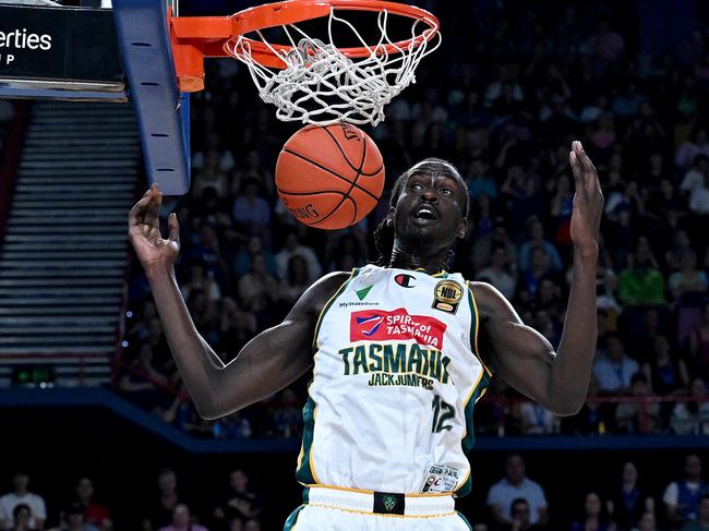 Gorjok Gak of the Jackjumpers slam dunks during Saturday’s win over Brisbane. (Photo by Bradley Kanaris/Getty Images)