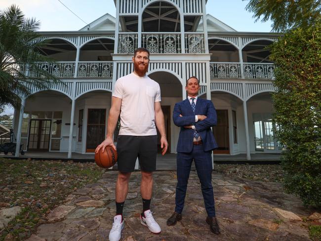 Aron Baynes at the property with Ray White agent Matt Lancashire. Picture: Peter Wallis