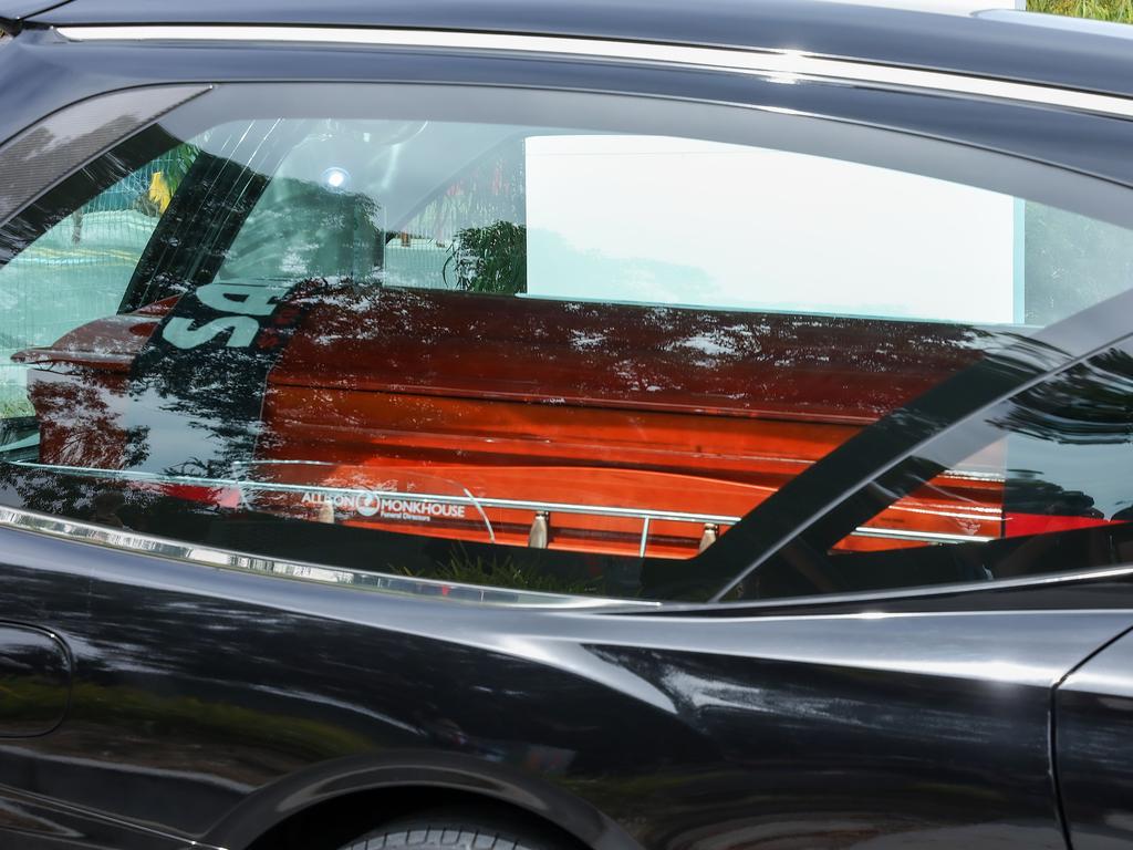 The hearse carrying Shane Warne’s coffin leaves the ground. Picture: Ian Currie