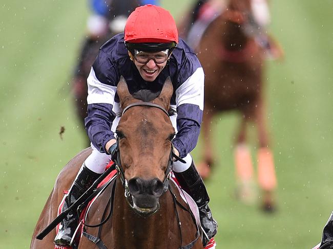 Kerrin McEvoy (left) rides Almandin to victory ahead of Heartbreak City ridden by Joao Moreira in the Melbourne Cup at Flemington Racecourse in Melbourne, Tuesday. Nov. 1, 2016. (AAP Image/Julian Smith) NO ARCHIVING, EDITORIAL USE ONLY