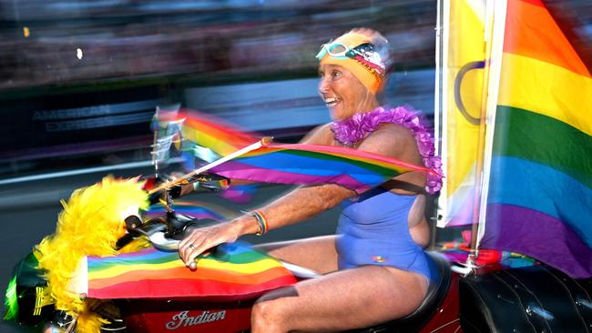 There’s no mistaking the joy on this motorcyclist’s face as she zooms down Oxford Street. Picture: AFP