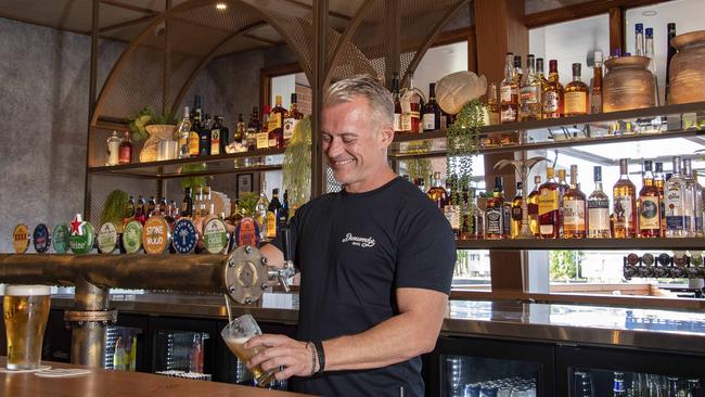 Dunwoody’s Mark Sorenson tests the new beer taps. Picture: Brian Cassey