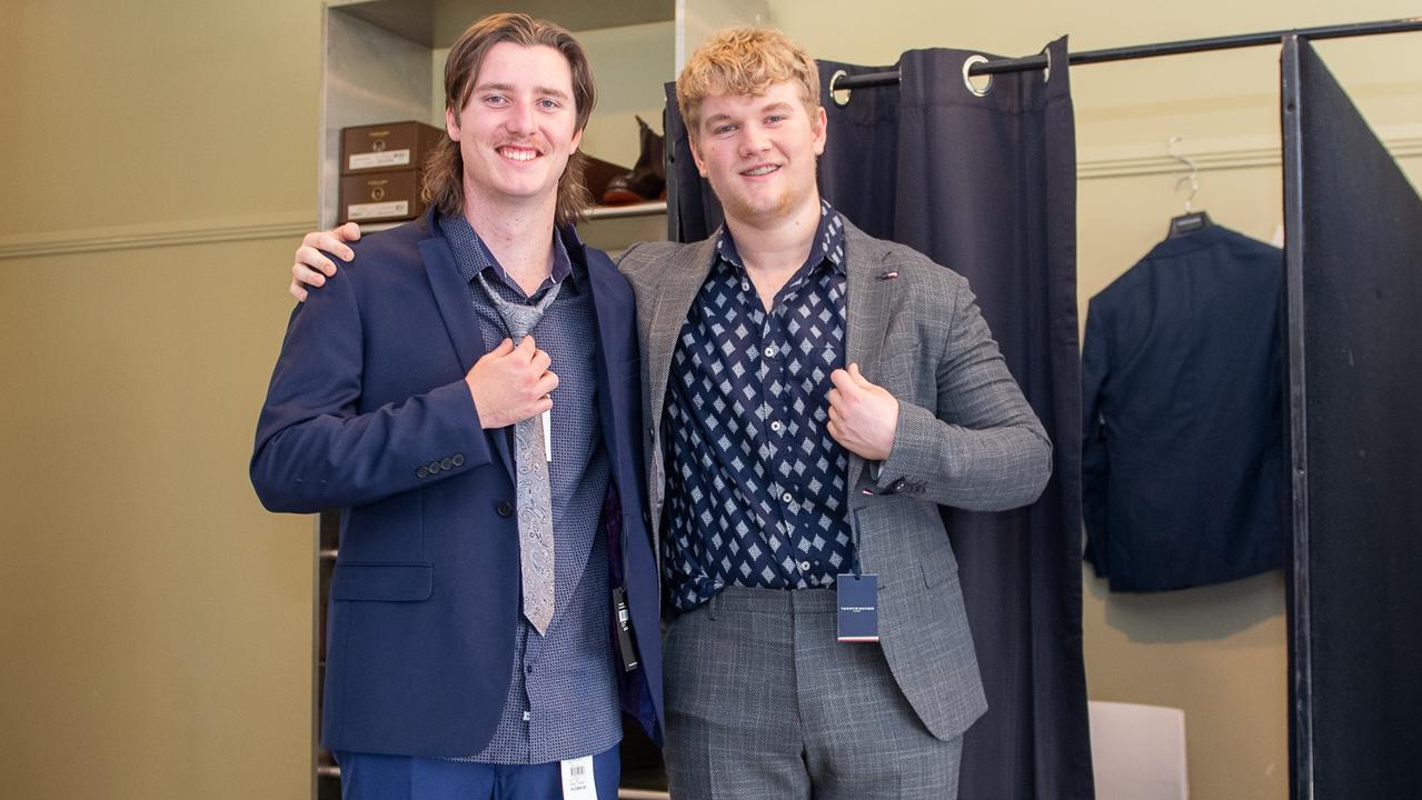 Left: Angus Enever and Connor McDougall being fitted for their year 12 formal suits at the Lismore Showgrounds on Thursday.