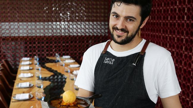 Head chef Mattia Rossi with the wood-fired caramelised persimmon and ginger tart