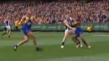 Willie Rioli blocks Brayden Maynard in the final quarter.