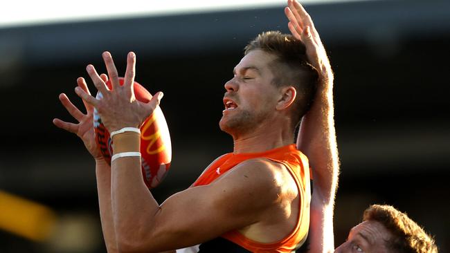 GWS utility Harry Himmelberg thinks he would like to remain in orange and charcoal beyond 2023 but says he is not in a rush to re-sign with the Giants. Picture: Phil Hillyard